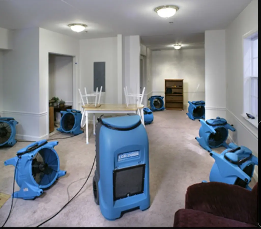 Air movers and dehumidifier setup for Water Damage Restoration in Green Hill